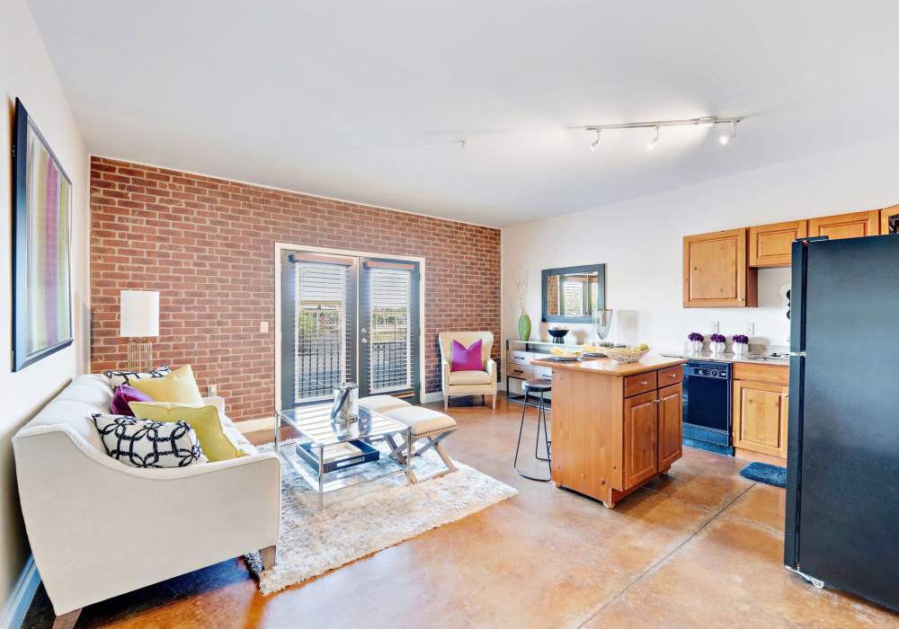 Living area and kitchen at CityView Apartments in Greensboro, North Carolina