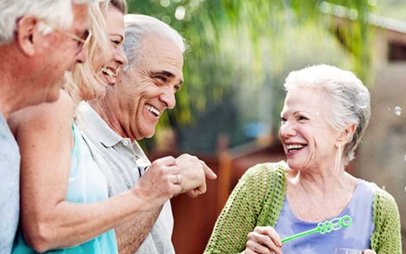 Group of new friends enjoying each others' company here at Grand Villa of Port Charlotte in Port Charlotte, Florida