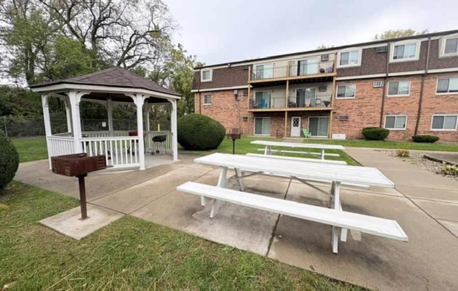 Outdoor community seating area at Edgewood Group Apartments in Merrillville, Indiana