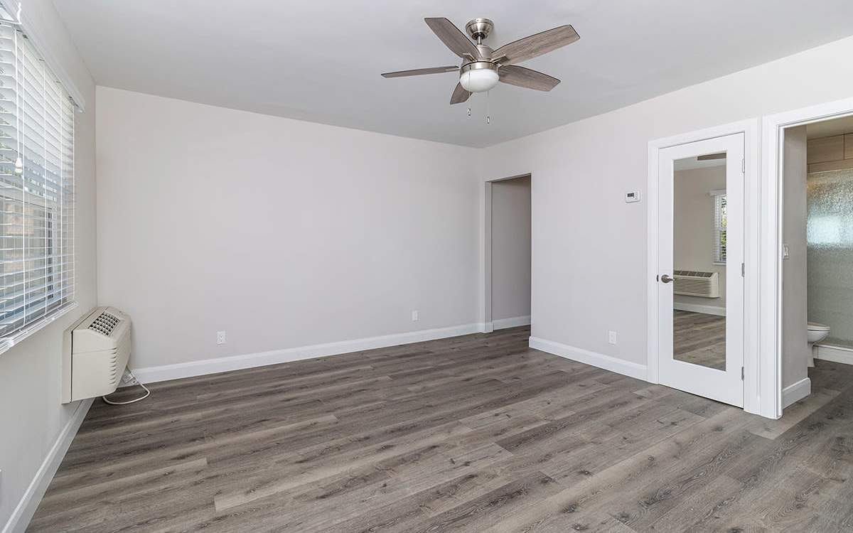 Unfurnished apartment with wood-style flooring at Iwood I in Inglewood, California