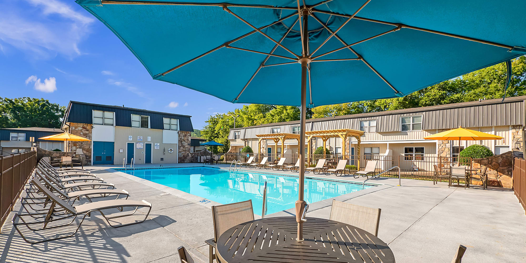 Swimming pool with nice outdoor furniture at Northshore Flats Apartments in Chattanooga, Tennessee