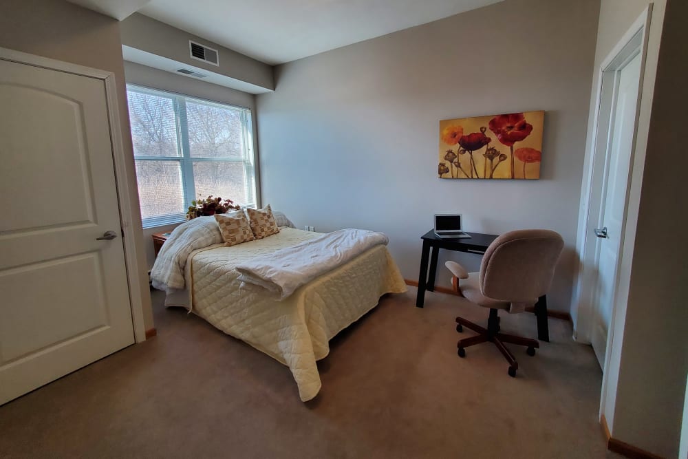 Bright resident bedroom at The Lakeside Village in Panora, Iowa.