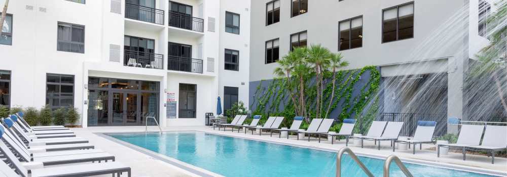 Poolside loungers at The Whitney in Fort Lauderdale, Florida