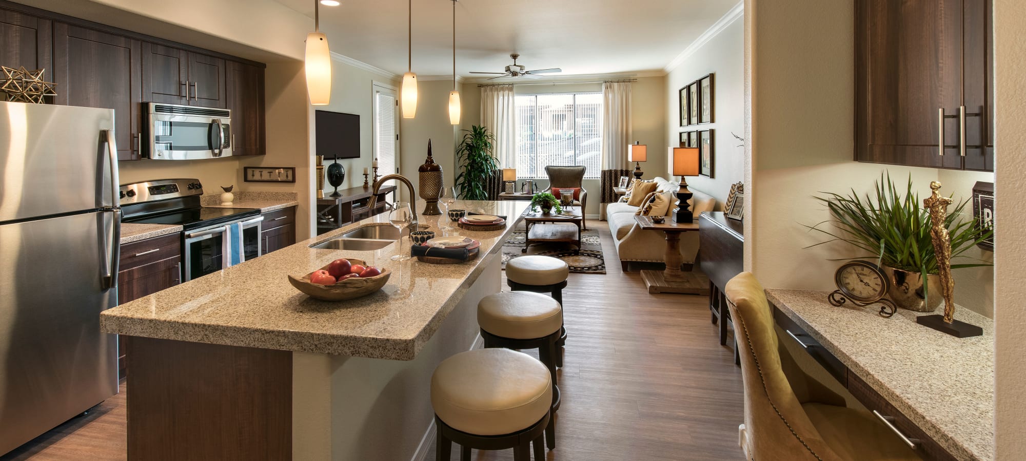 Open kitchen with breakfast bar at San Travesia in Scottsdale, Arizona