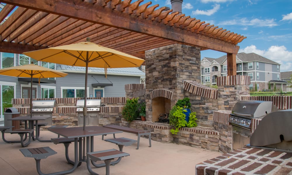 Outdoor grill and seating at Cottages at Crestview in Wichita, Kansas