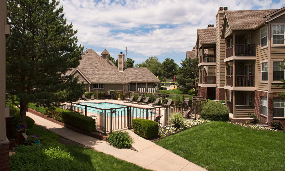 Exterior with pool at Crown Chase Apartments in Wichita, Kansas