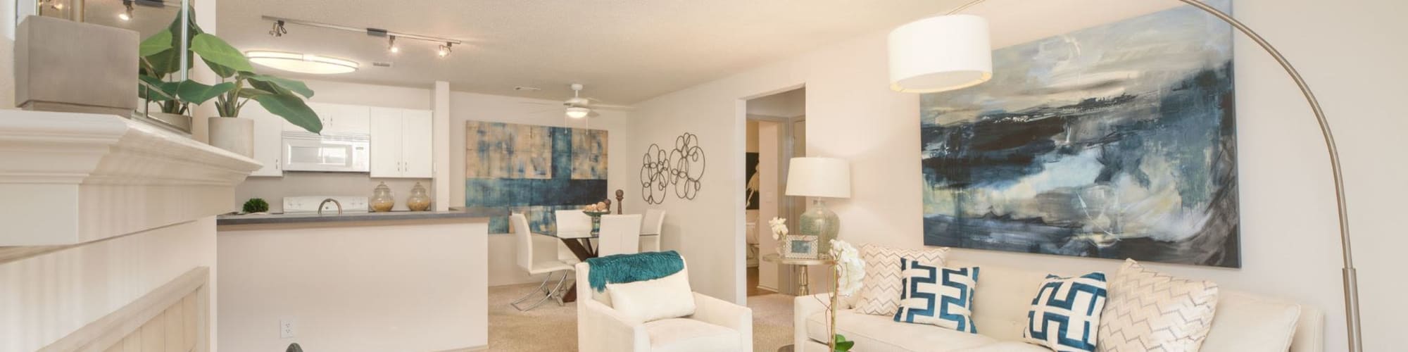 Large living room staged with stylish furniture