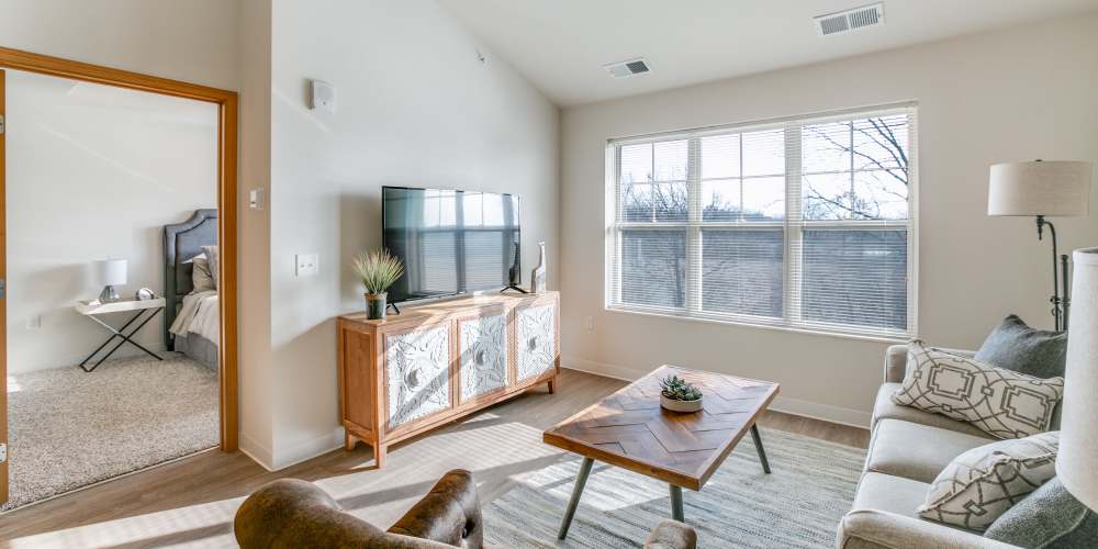 Well-lit living room with a television at Whitetail Ridge in Salem, Wisconsin