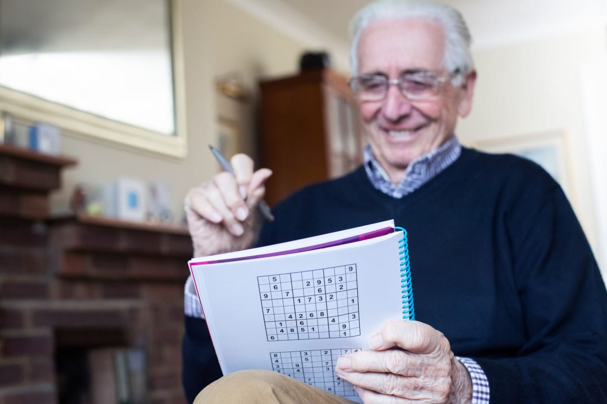 A resident doing a word search at Ashbrook Village in Duncan, Oklahoma