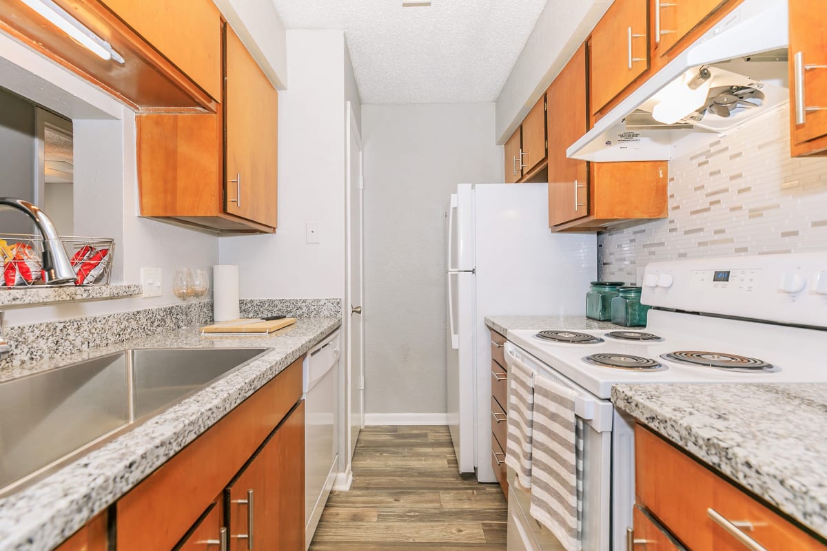 Kitchen interiors at Harbour Landing Apartments in Corpus Christi, Texas