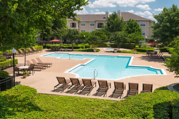 Outdoor pool at Ballantyne Apartments in Lewisville, Texas