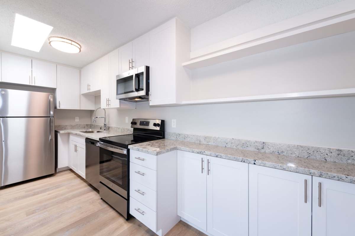 Kitchen with appliances at Oak & Iron in Walnut Creek, California