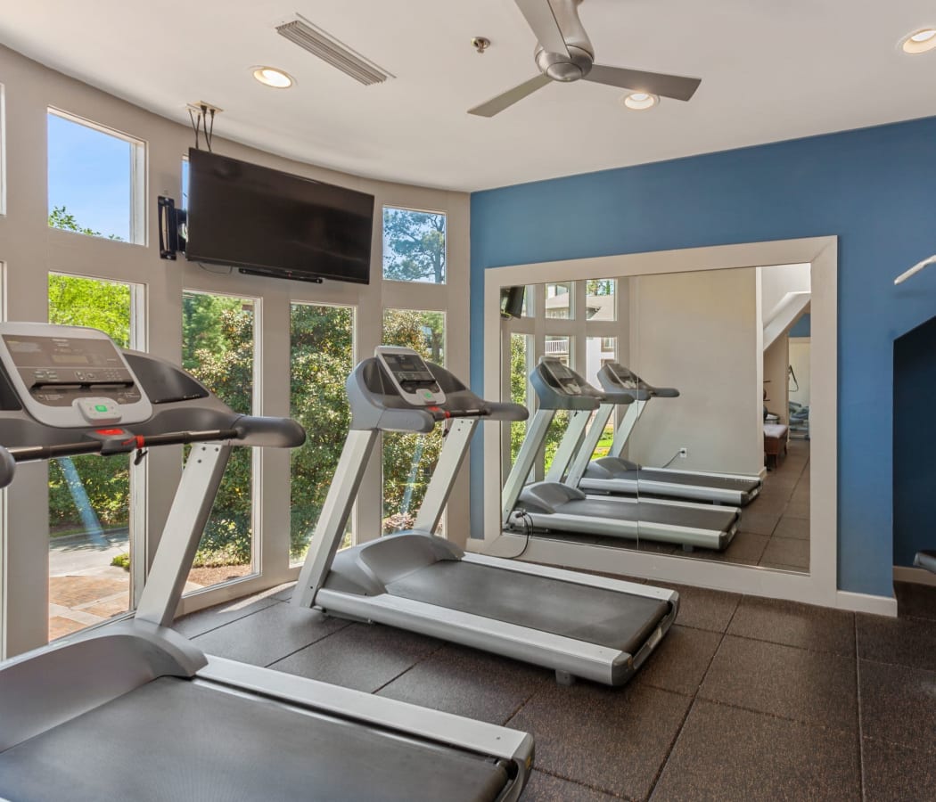 Fitness center with a gorgeous view at 45Eighty Dunwoody Apartment Homes in Dunwoody, Georgia