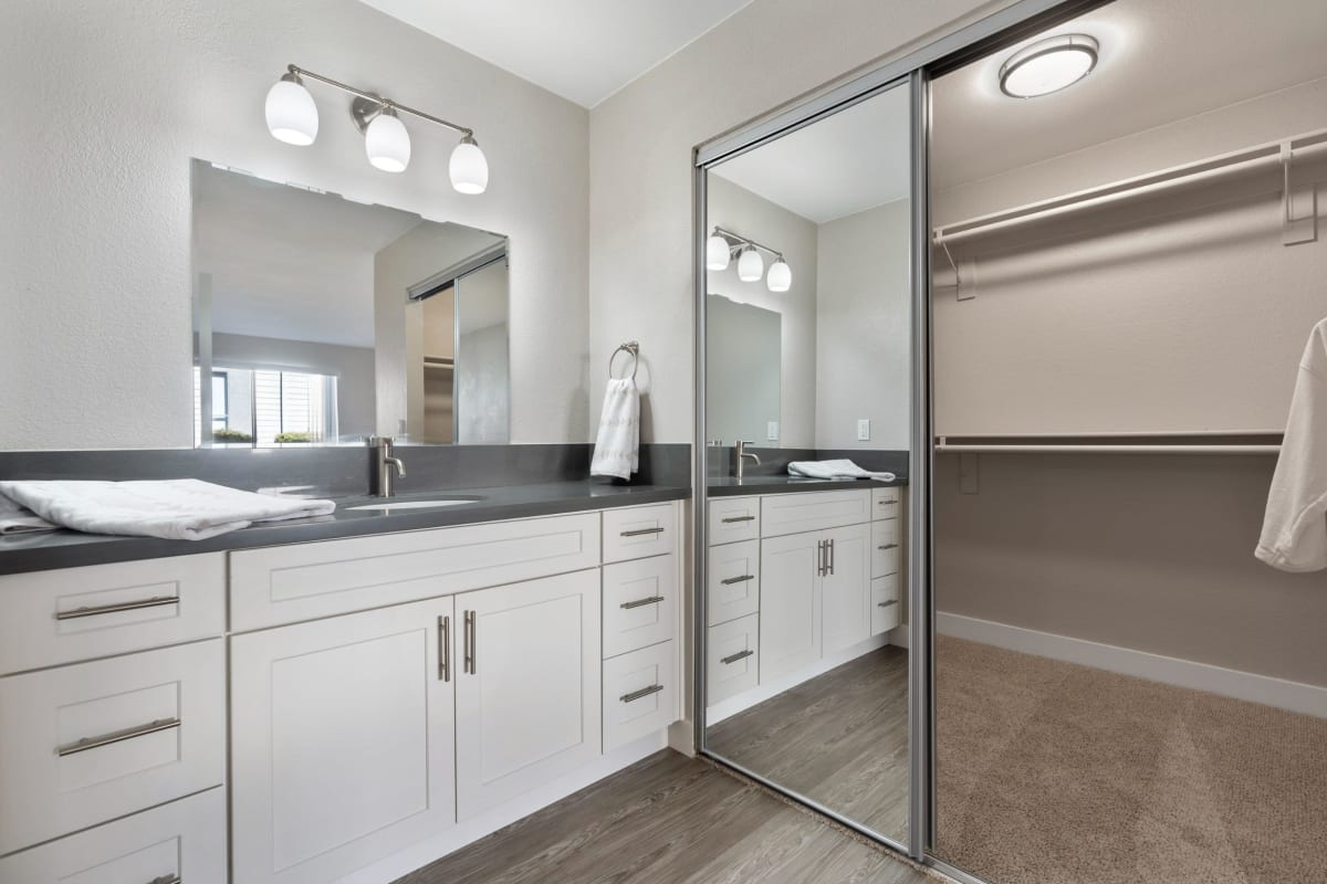 Bathroom with mirrored closet door at Willow Creek, San Jose, California