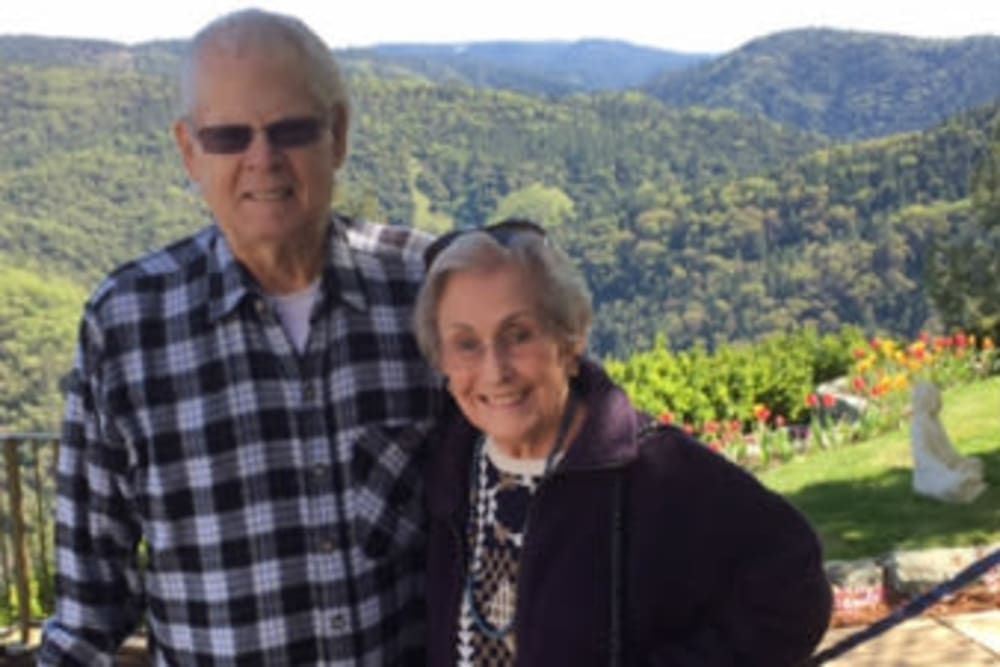 Residents out enjoying the beautiful outdoors at Hilltop Commons Senior Living in Grass Valley, California