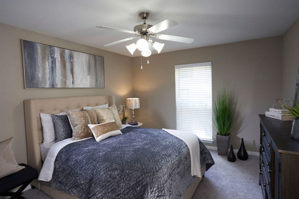 furnished bedroom of model unit at The Fountains of Preston Hollow in Dallas, Texas