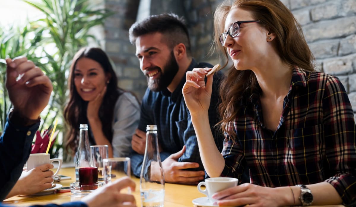 Friends enjoy coffee at their favorite spot near THE RESIDENCES AT LANDON RIDGE, San Antonio, Texas