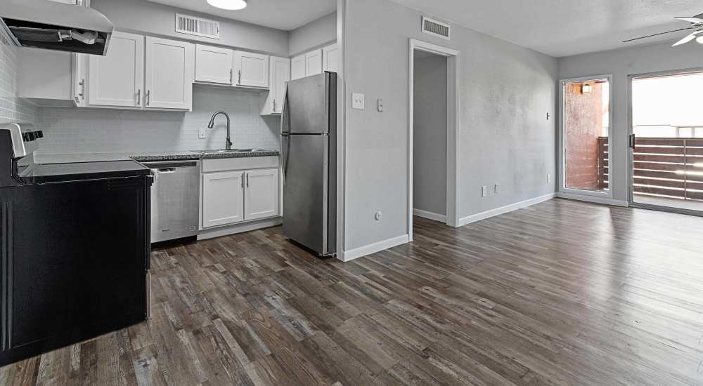 Living area with access to kitchen at Aria Residences in Mesquite, Texas
