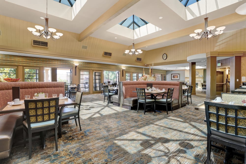 Elegant dining room with chandeliers at The Reserve at Thousand Oaks in Thousand Oaks, California
