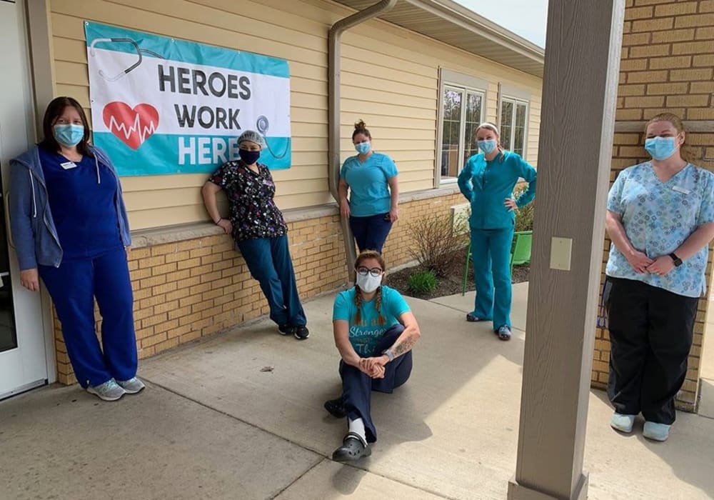 Caretakers and nurses outside of Holton Manor in Elkhorn, Wisconsin