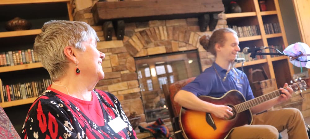 Resident enjoying live music at The Springs at Missoula in Missoula, Montana