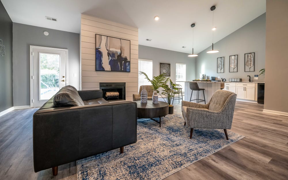 Stylish resident clubhouse with a fireplace at Clemmons Station Apartment Homes in Clemmons, North Carolina