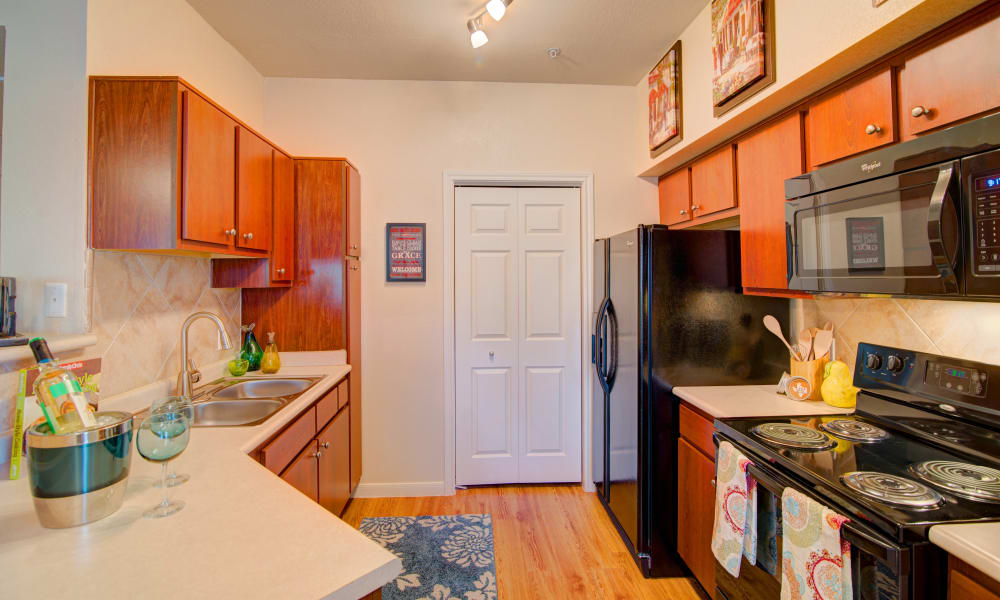 Fully equipped kitchen at Park Hudson Place in Bryan, Texas