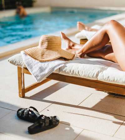     Person by the pool at Serene at La Villita in Irving, Texas