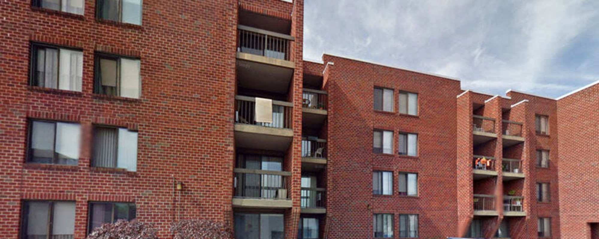 Brick apartment building exterior at Victory Gardens in East Boston, Massachusetts