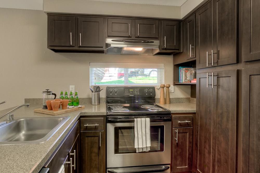 Fully equipped kitchen at Park South Apartments in Seattle