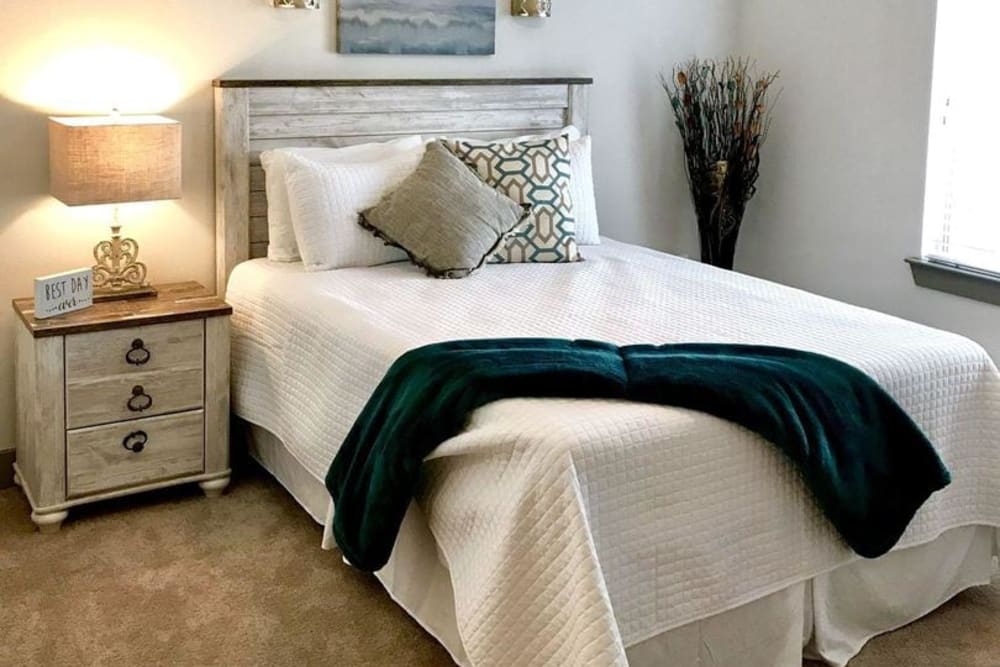 Model bedroom with plush carpeting at Argon in Oklahoma City, Oklahoma