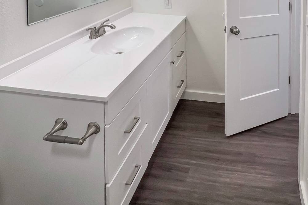 Wooden flooring in bathroom at Quail Run in Oklahoma City, Oklahoma 