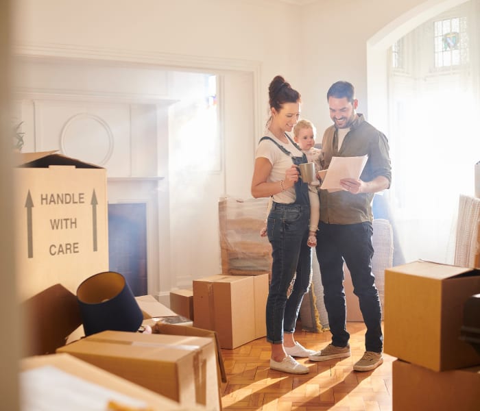 A family planning their move at Urban Self Storage.