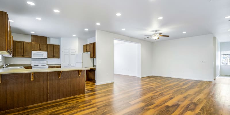 Open concept living, dining and kitchen area at Meriwether Landing in Joint Base Lewis McChord, Washington