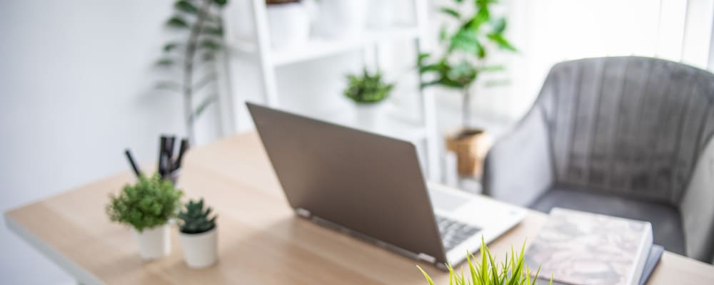 A laptop on a desk in a home office at Windsor Park in Woodbridge, Virginia