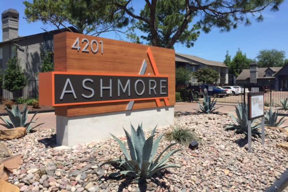 Property entrance with signage board at Ashmore in Pasadena, Texas