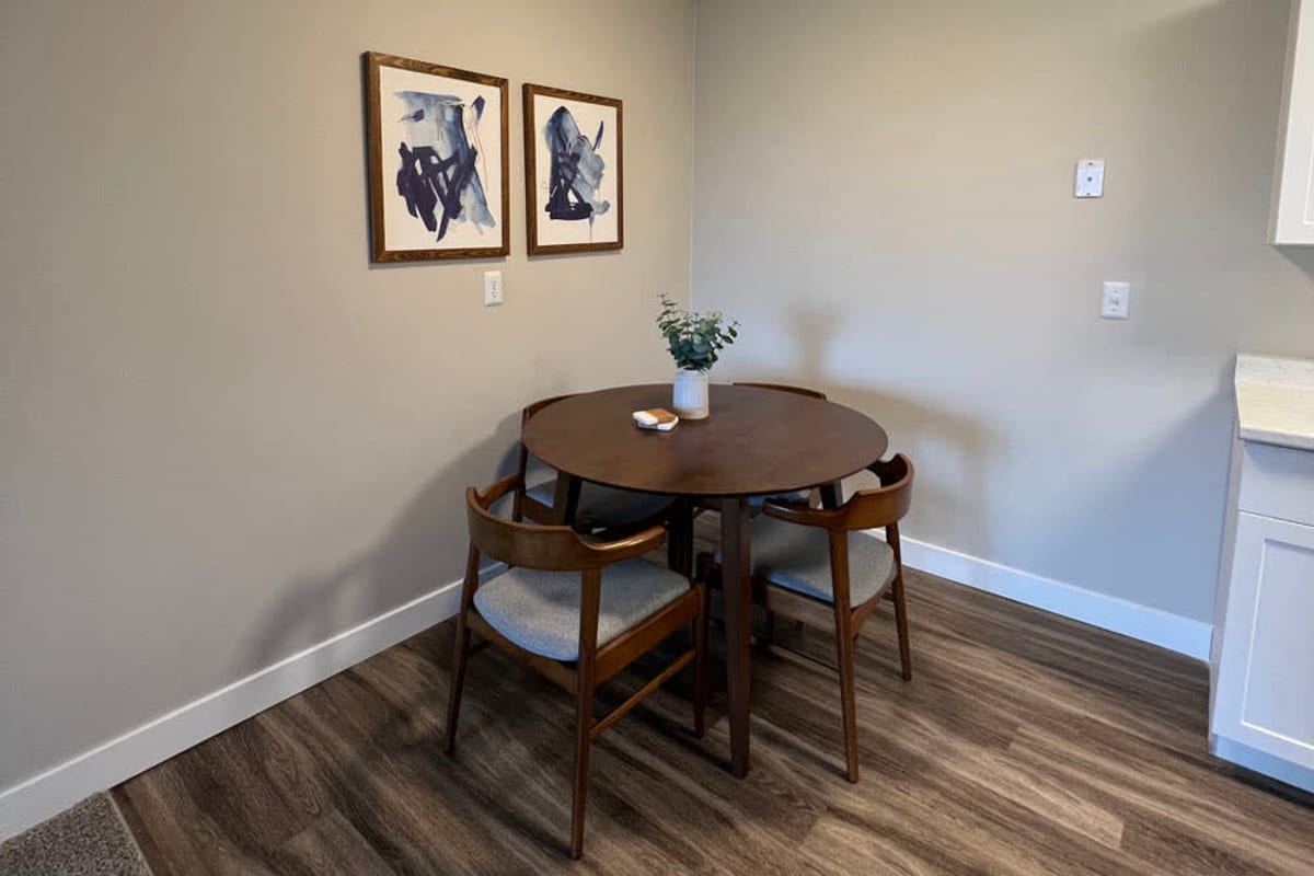 Wood-style flooring in an apartment dining area at The Pointe at Cedar Grove in Eagan, Minnesota