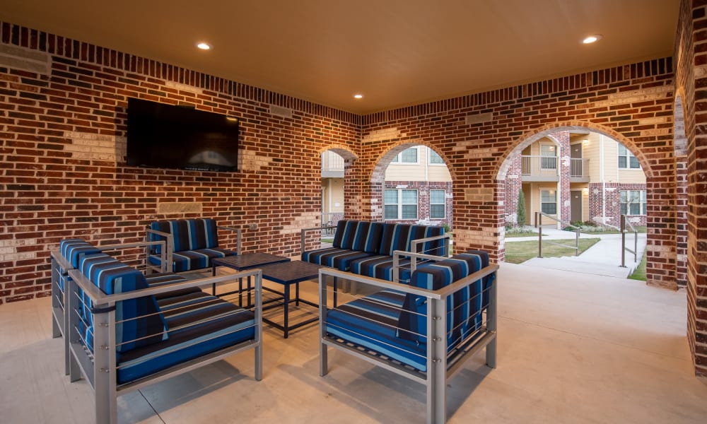Outdoor seating at Portico at Friars Creek Apartments in Temple, Texas