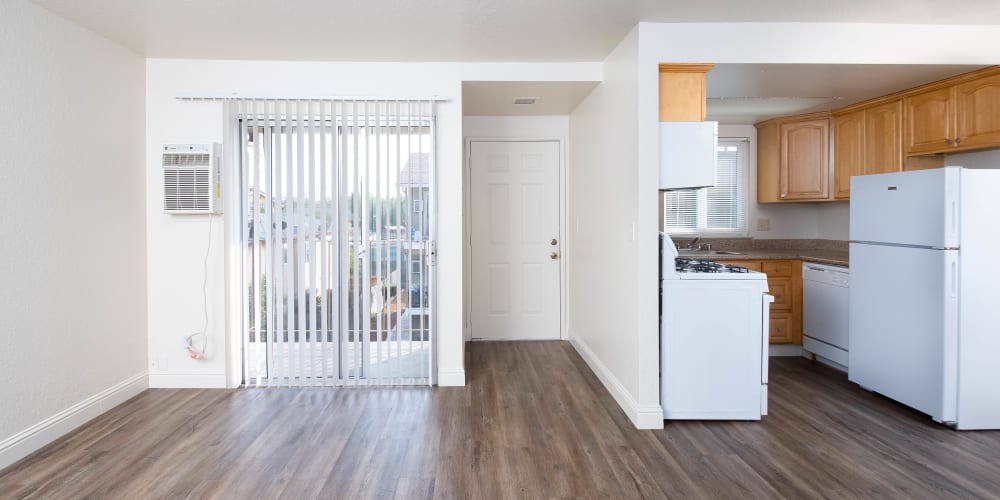 Apartment with wood-style flooring at Alderwood Park Apartments in Livermore, California