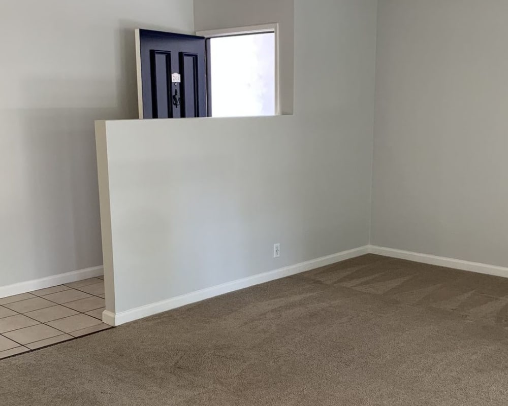 Entrance to an apartment with carpet at Redwood Plaza in Fremont, California