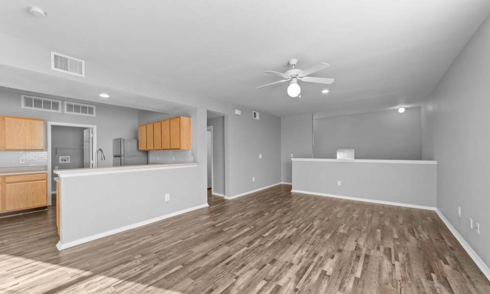 Living room with wood style flooring at Burkburnett Residences in Burkburnett, Texas