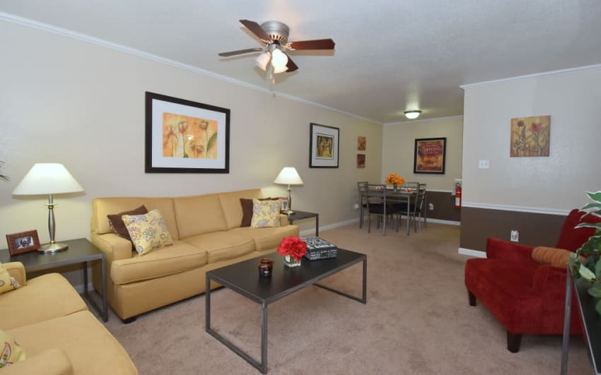 Spacious living room at Falls of Maplewood Apartments
