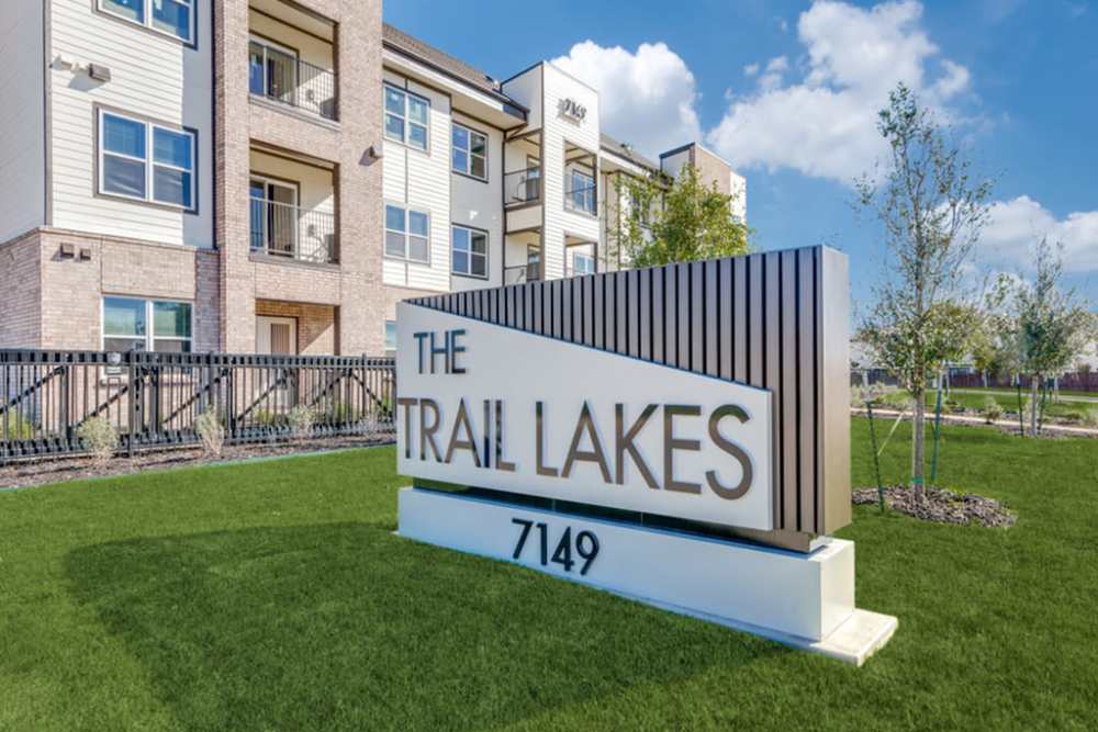 Property signage board at The Trail Lakes in Fort Worth, Texas