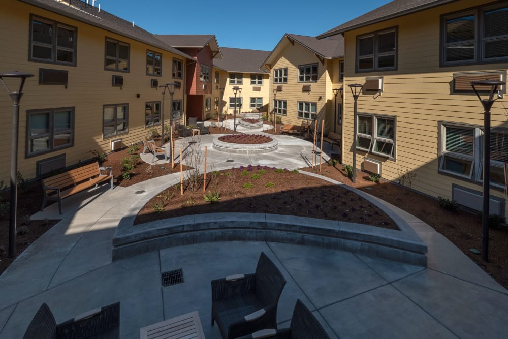 Central courtyard with comfortable seating at Pear Valley Senior Living in Central Point, Oregon