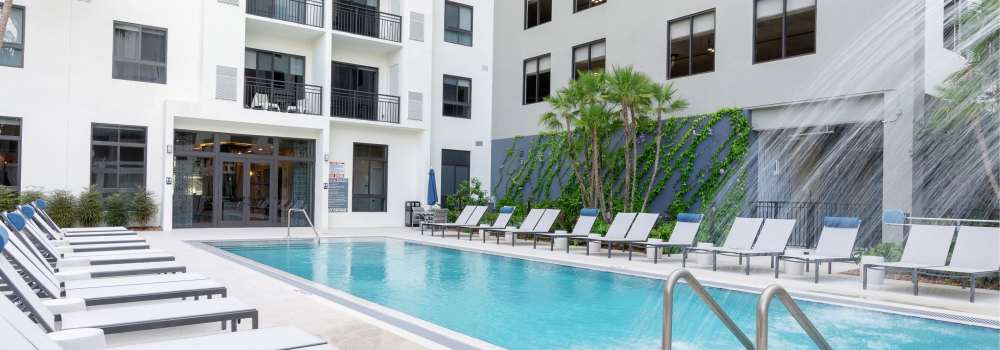Poolside loungers at The Whitney in Fort Lauderdale, Florida
