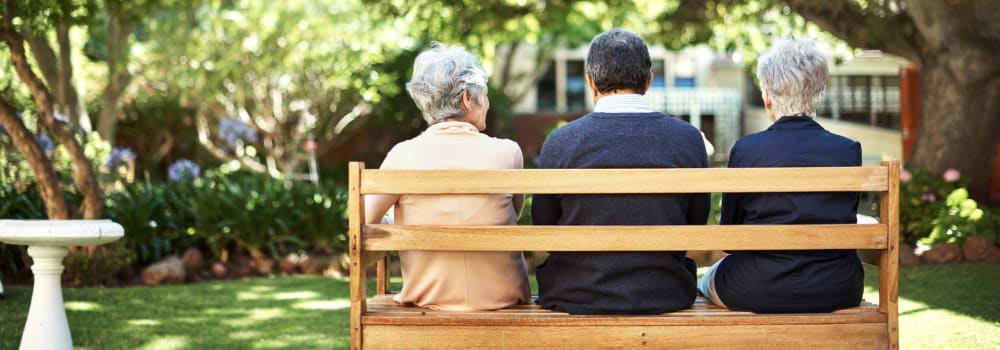 Residents sitting on a bench  at The Residences at Miami,Miami, FL