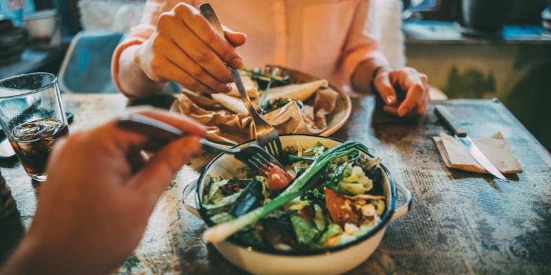 residents eating near Terrace View Villas in San Diego, California