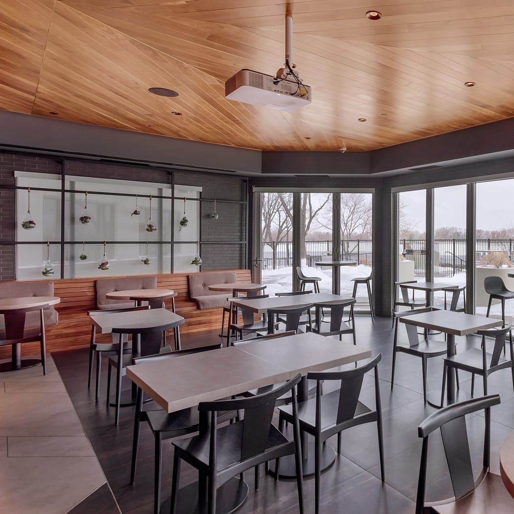 Dining area at TAVA Waters's The CAIRN restaurant in Denver, Colorado
