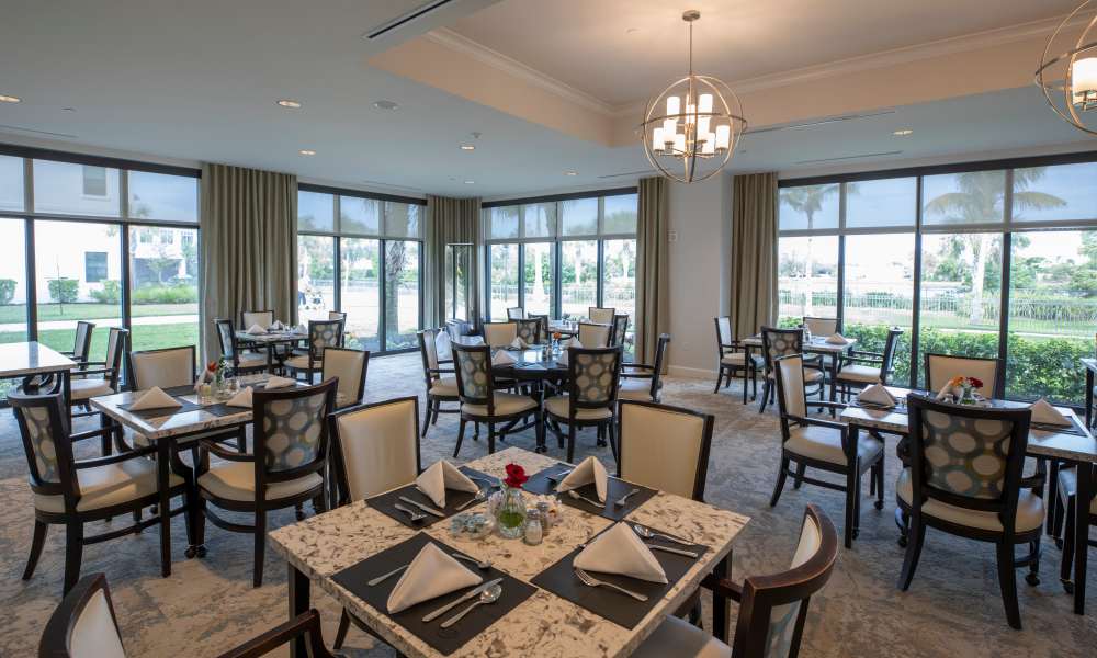 Indoor dining area at Keystone Place at Beachwalk in Fort Myers, Florida