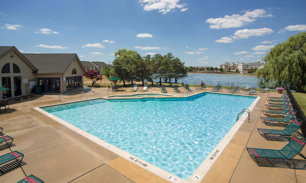 Swimming pool with sundeck on a sunny day at Lakeside Terraces in Sterling Heights, Michigan